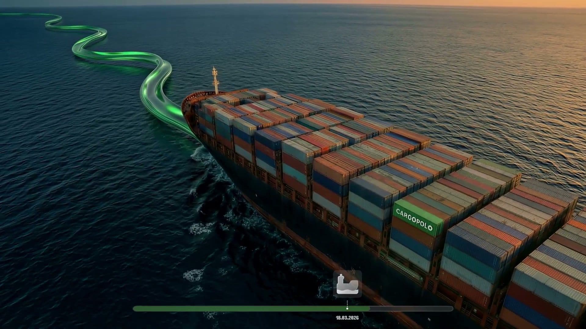 Aerial view of a cargo ship at sea with CARGOPOLO branding on a container and green ribbon trailing behind